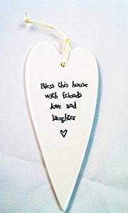 Hanging heart with new home message